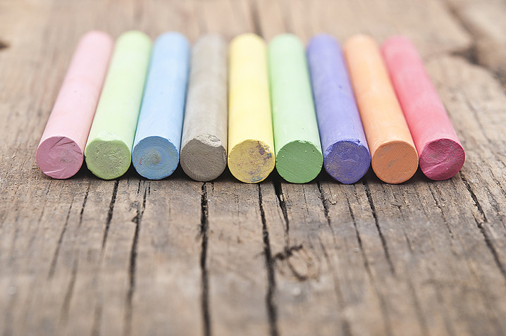 Pieces of colorful chalk.